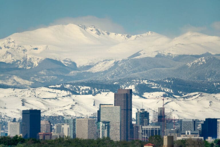 Denver Skyline with snowy mountains